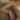 Close-up of an arm resting on a chair, hand with fingers and dress fabric. Brim of Secrets