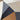 Närbild av geometriska trianglar i grått, beige, svart och orange. The Composed Aperitif